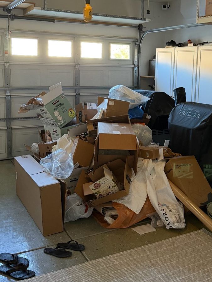 Garage packed with cardboard, packaging and old boxes