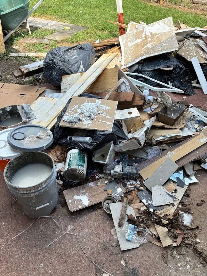 Drywall, lumber and renovation debris piled up after a remodel